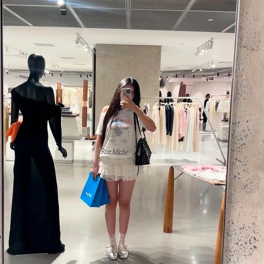 VI PICK personal shopper checking Vietnamese fashion in a local store